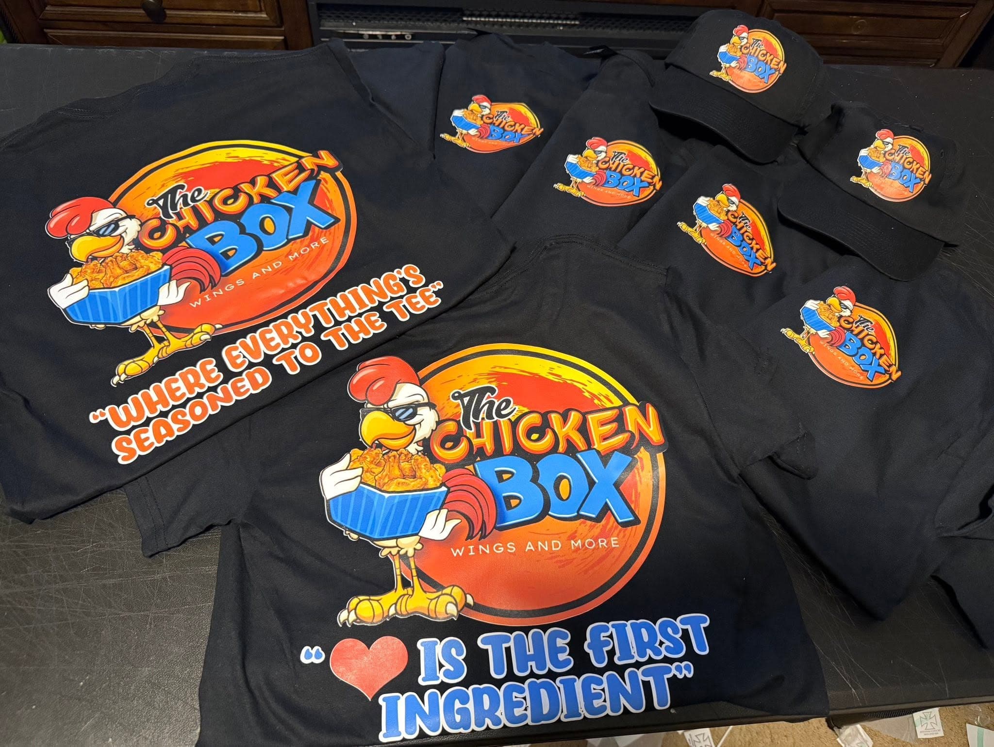 The Chicken Box branded merch tees